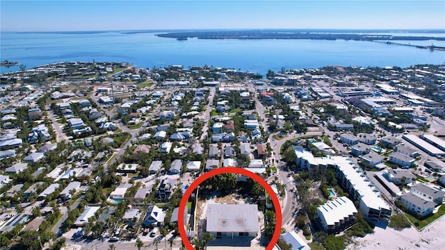 aerial view with a water view and a residential view