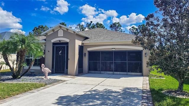 single story home featuring a garage