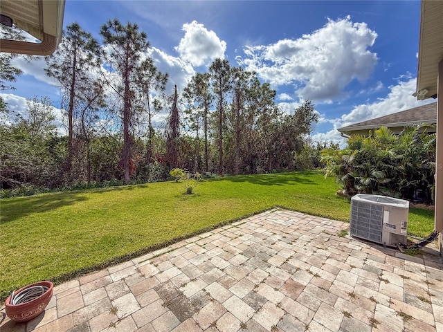 view of patio with central AC