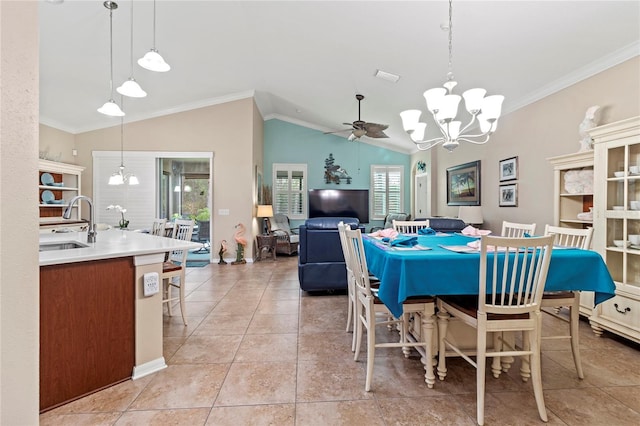 dining room featuring light tile patterned flooring, vaulted ceiling, ceiling fan with notable chandelier, ornamental molding, and sink