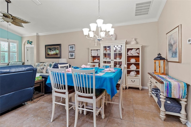 dining space featuring light tile patterned floors, crown molding, and ceiling fan with notable chandelier