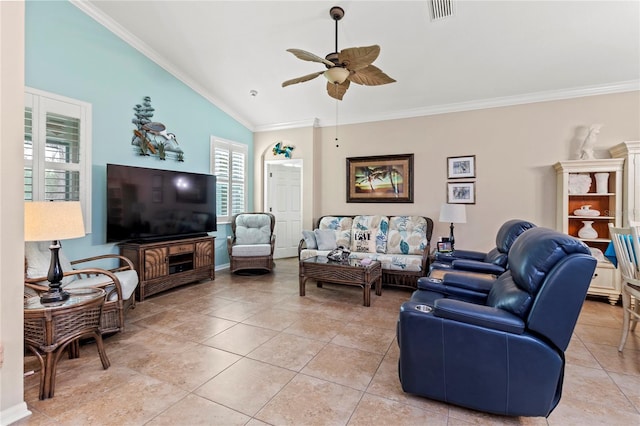 tiled living room featuring lofted ceiling, ceiling fan, and ornamental molding