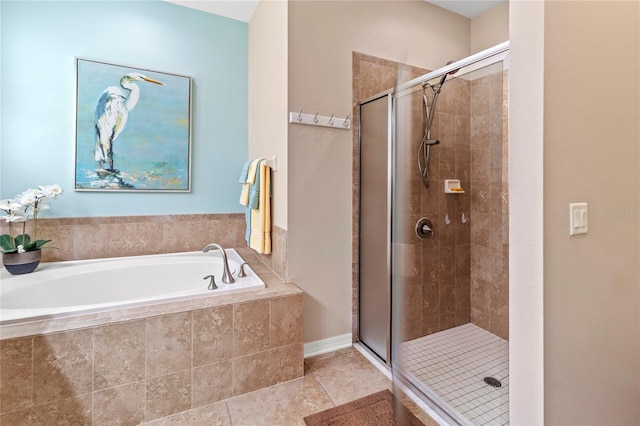 bathroom featuring independent shower and bath and tile patterned floors