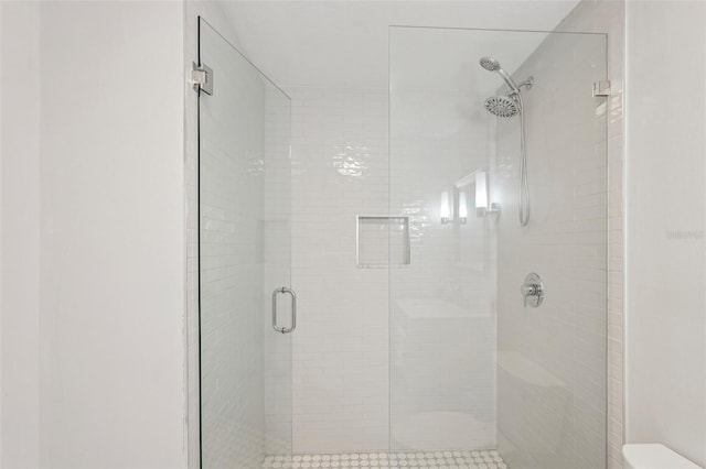 bathroom with an enclosed shower