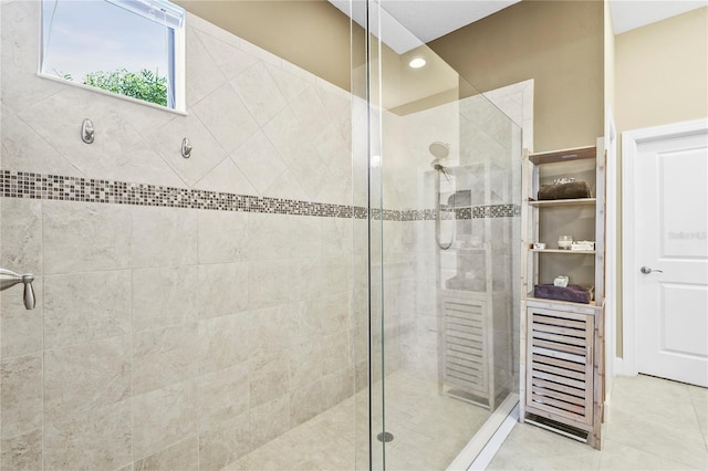 bathroom featuring a shower stall and tile patterned floors