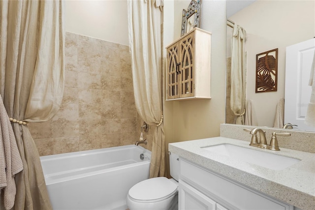 full bath featuring shower / bath combination with curtain, vanity, and toilet