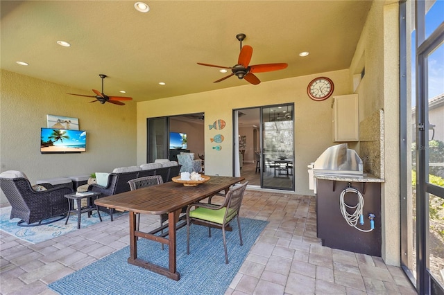 view of patio featuring outdoor dining area, ceiling fan, and an outdoor living space