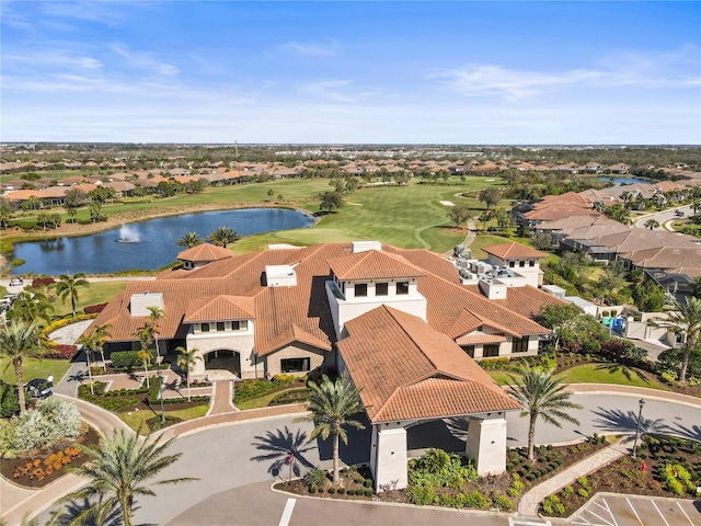 bird's eye view with a water view and a residential view