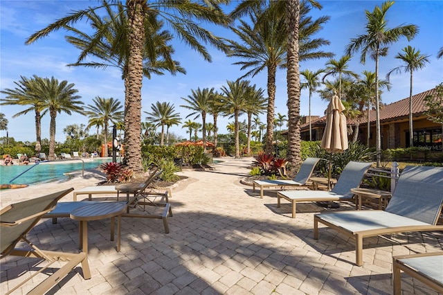 view of patio with a community pool