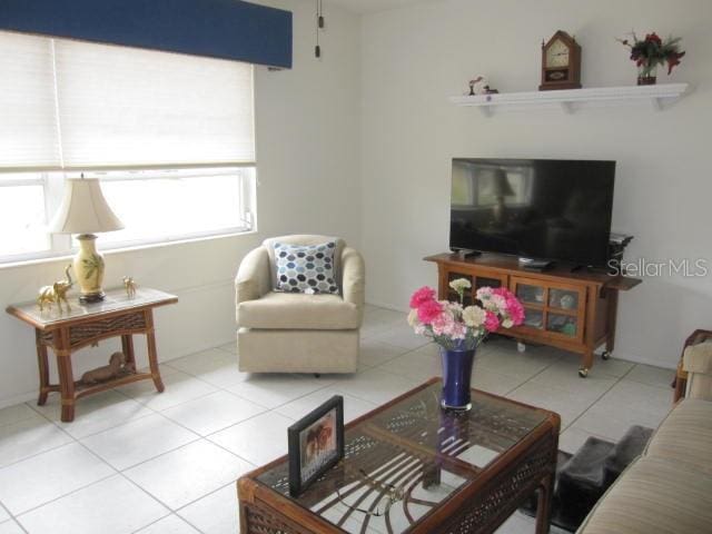 living room featuring tile patterned floors