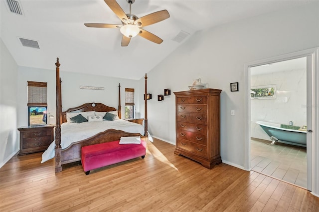 7415 36th Ave E, Palmetto, FL 34221 - bedroom with hardwood / wood-style floors, vaulted ceiling, and ceiling fan