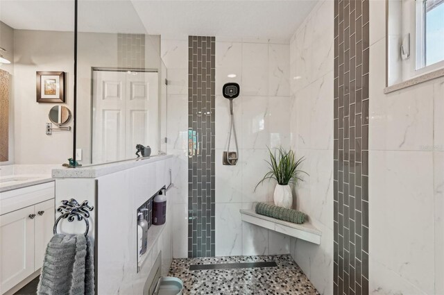 7415 36th Ave E, Palmetto, FL 34221 - bathroom featuring a tile shower and vanity