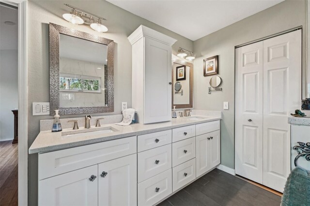7415 36th Ave E, Palmetto, FL 34221 - bathroom with vanity and hardwood / wood-style floors