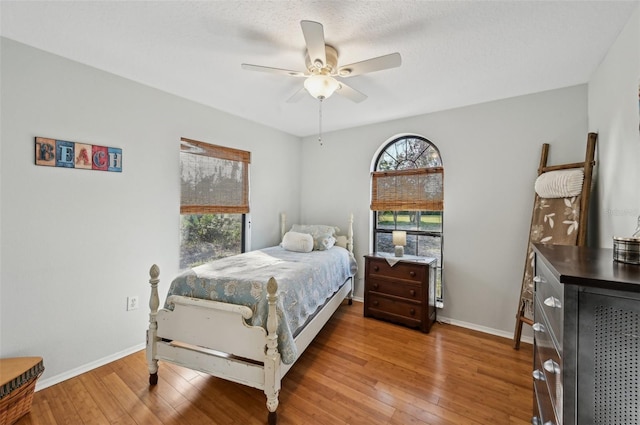 7415 36th Ave E, Palmetto, FL 34221 - bedroom with wood-type flooring and ceiling fan