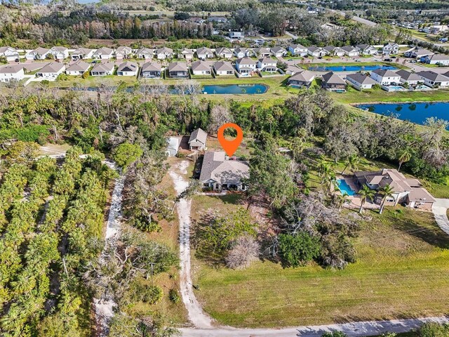 7415 36th Ave E, Palmetto, FL 34221 - birds eye view of property with a water view