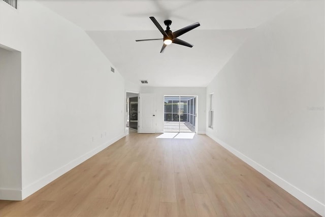 empty room with high vaulted ceiling, ceiling fan, and light wood-type flooring