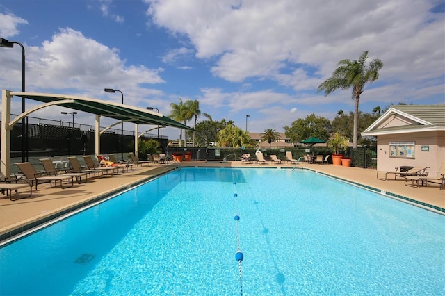 view of swimming pool with a patio area