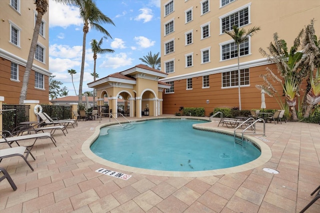 147 Tampa Ave E Unit 702, Venice, FL 34285 - community pool featuring a patio