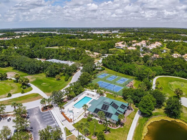 birds eye view of property with golf course view