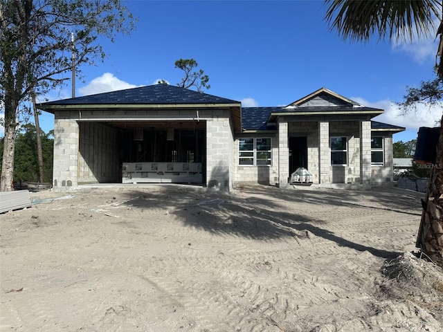 property in mid-construction featuring a garage