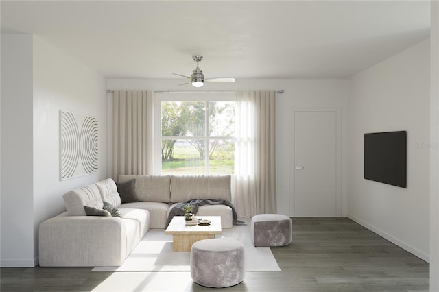 living room featuring hardwood / wood-style floors and ceiling fan