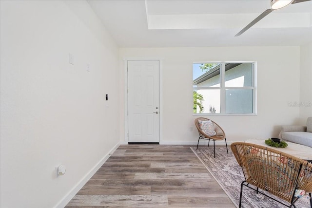 18290 Grace Ave, Port Charlotte, FL 33948 - entryway with wood finished floors and a skylight
