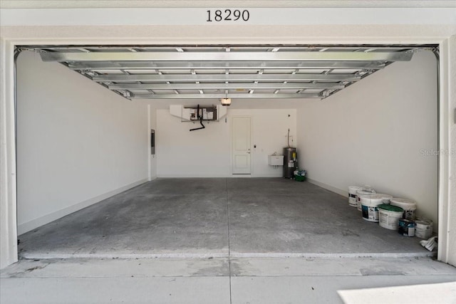 18290 Grace Ave, Port Charlotte, FL 33948 - garage with electric water heater