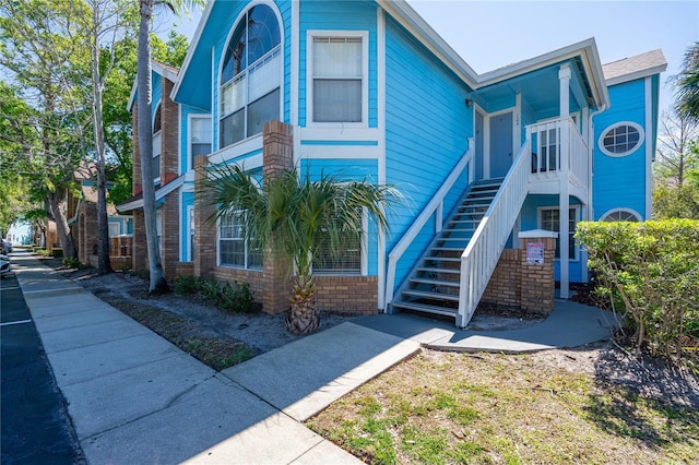 2735 N Poinciana Blvd Unit 103, Kissimmee, FL 34746 - view of front facade with stairway