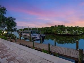 view of dock with a water view