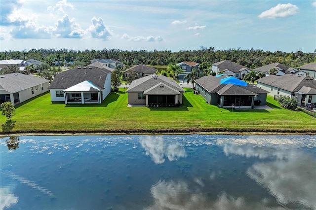 drone / aerial view featuring a water view