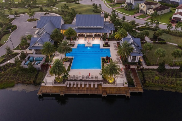 birds eye view of property featuring a water view