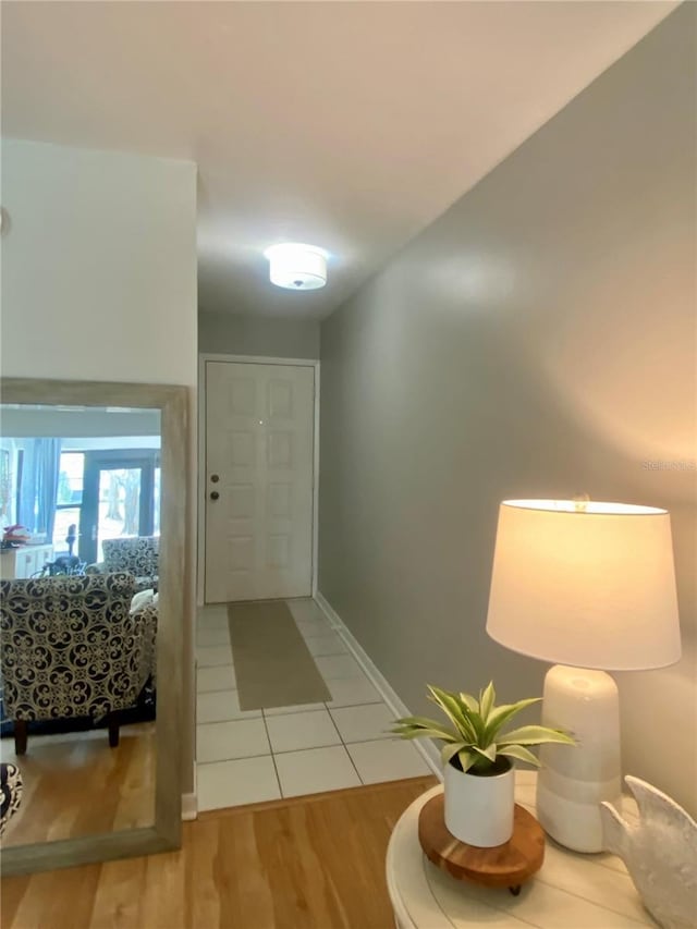 entryway with light hardwood / wood-style floors