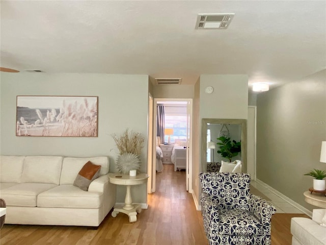 living room with wood-type flooring