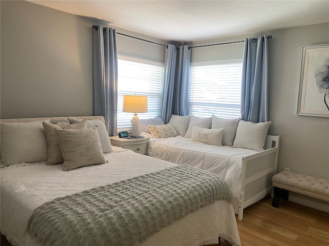 bedroom featuring wood-type flooring