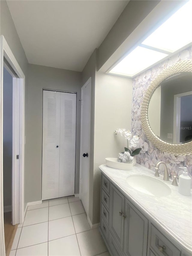 bathroom featuring vanity and tile patterned flooring