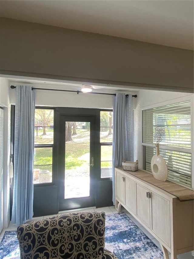 entrance foyer featuring light tile patterned flooring