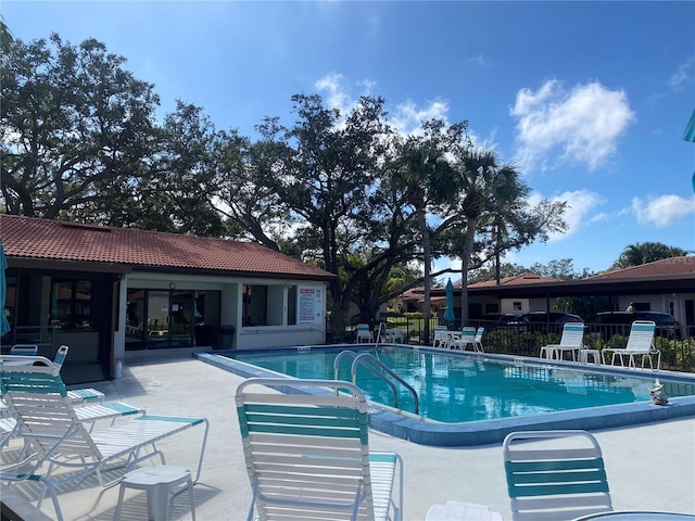 view of pool featuring a patio