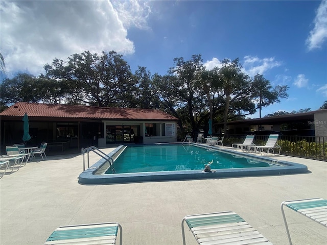 view of pool featuring a patio area