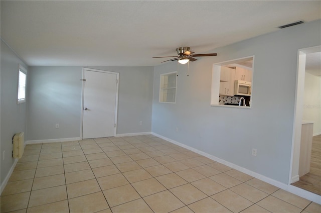 empty room with ceiling fan