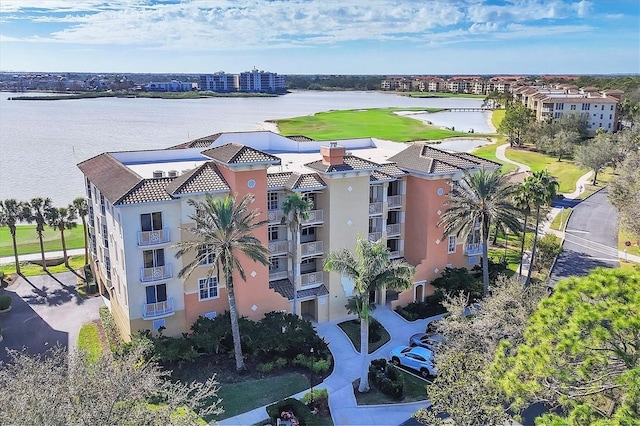 drone / aerial view featuring a water view