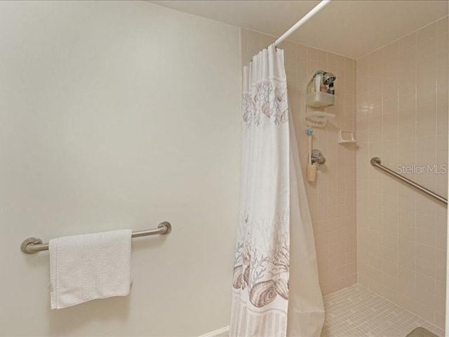 full bathroom with a stall shower