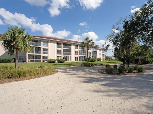 view of property featuring driveway