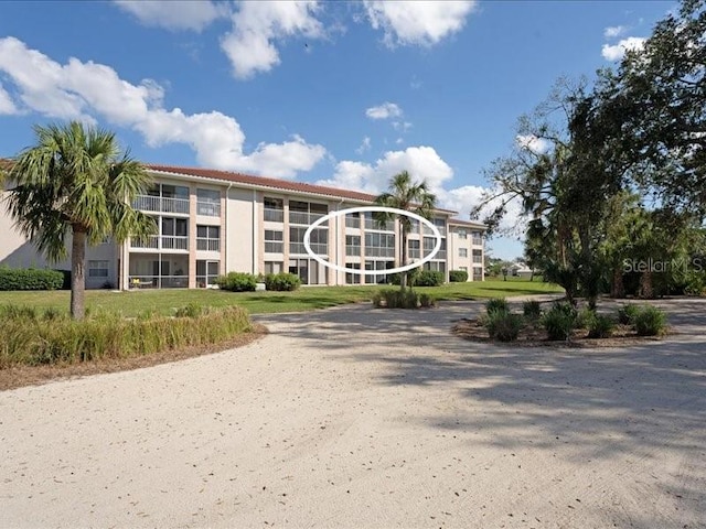 view of building exterior featuring driveway