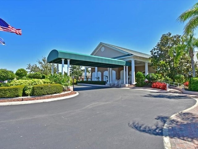 view of property featuring driveway