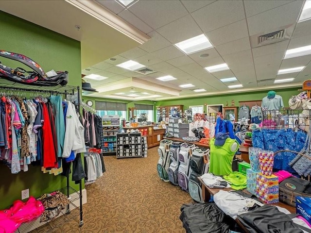 miscellaneous room with a drop ceiling and visible vents