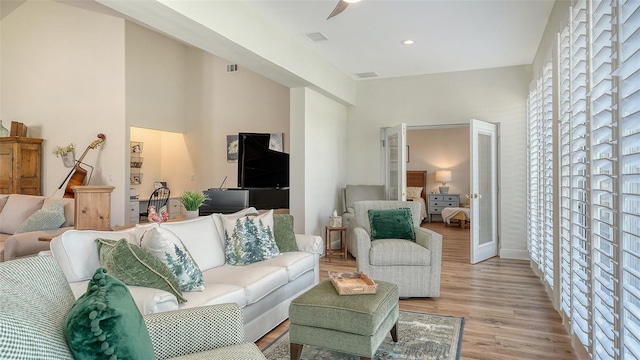 4060 Penshurst Park, Sarasota, FL 34235 - living area featuring wood finished floors, visible vents, and ceiling fan