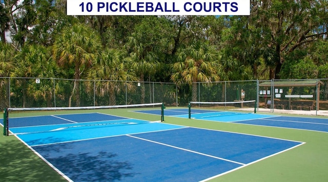4060 Penshurst Park, Sarasota, FL 34235 - view of tennis court with community basketball court and fence