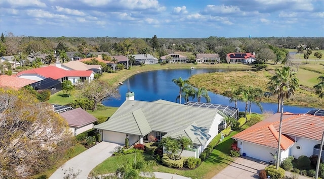 bird's eye view with a water view