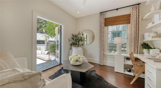 interior space featuring dark hardwood / wood-style floors and built in desk