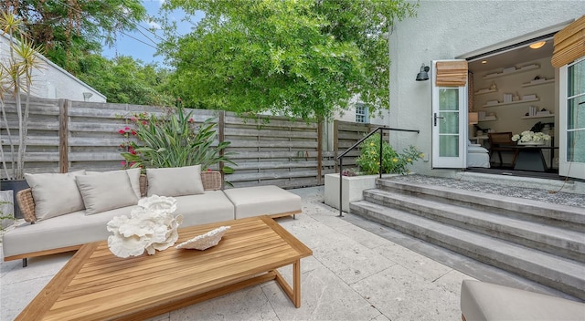 exterior space featuring an outdoor hangout area